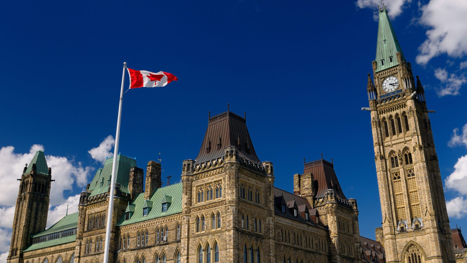 Ottawa Parliament Buildings Center Block with Peace Tower and Canadian flag